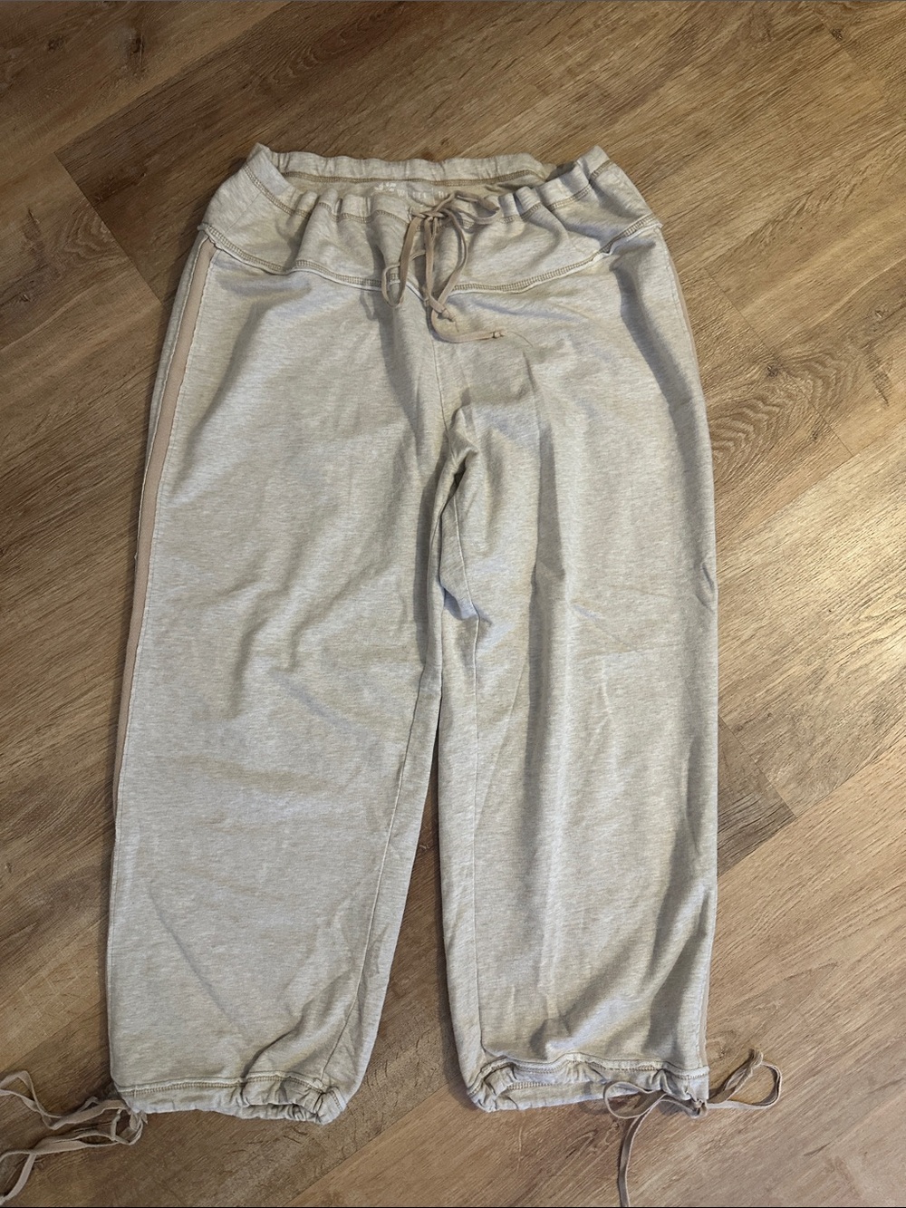 So cute White House Black Market Cream Drawstring Capris with Side Stripe